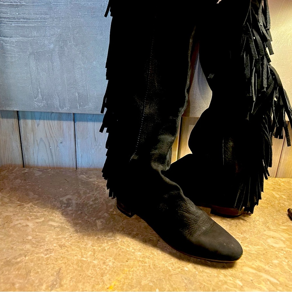 Genuine leather, high boots for a stylish girl. A blouse as a gift